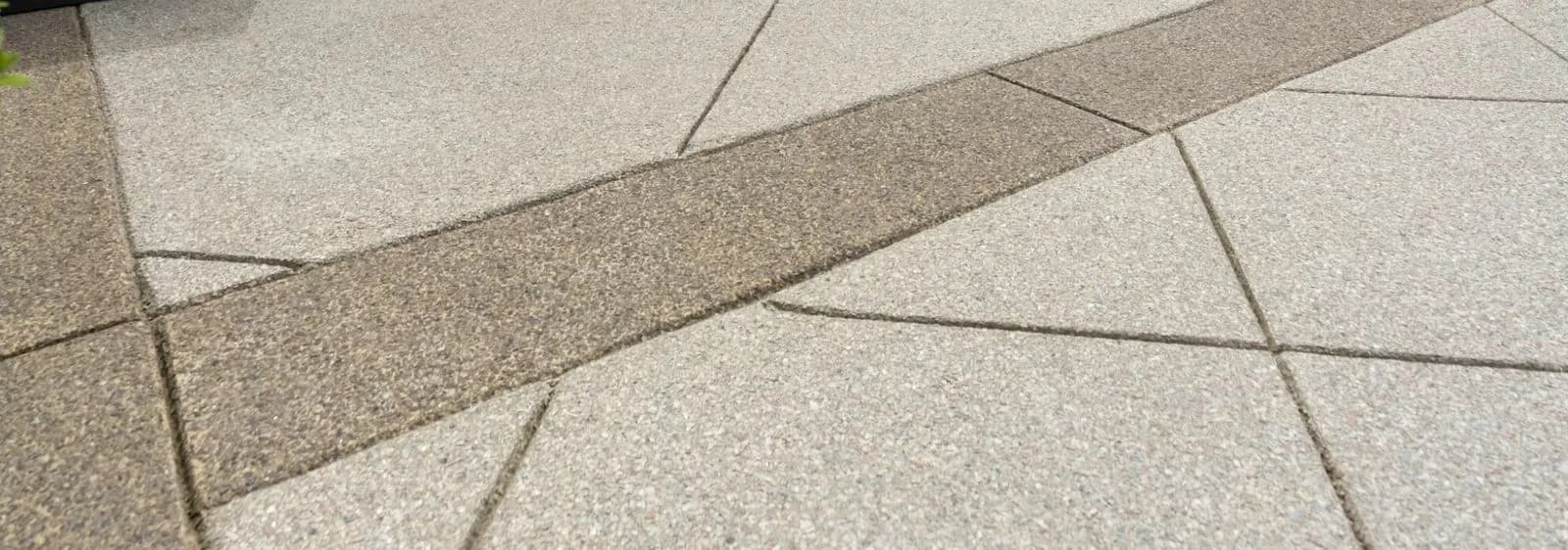 Professional driveway coating with decorative finish